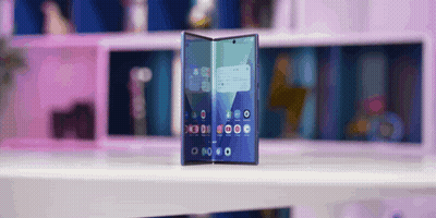 A Phone With A Purple Background Shows The Time As 8:20 GIF