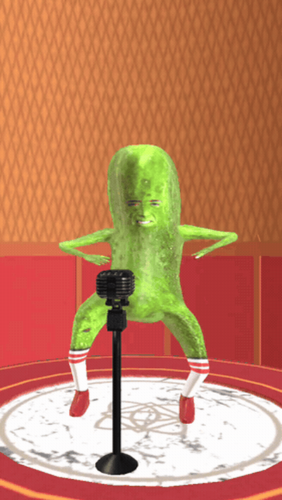 A Pickle With A Microphone In Front Of It GIF
