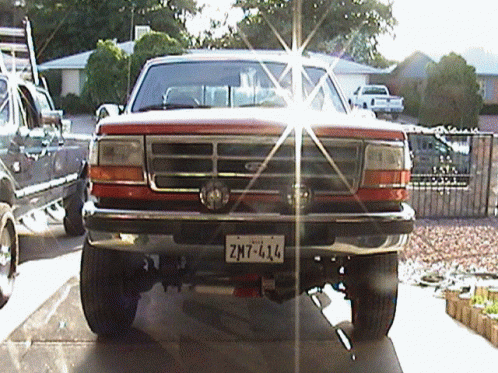 A Pickup Truck With A License Plate That Says Zmt-414 GIF