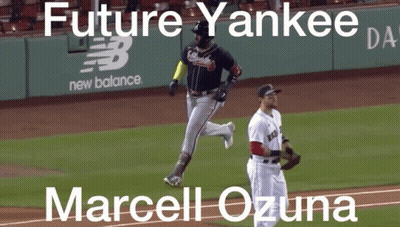 A Picture Of A Baseball Game With The Name Marcel Ozuna On The Bottom GIF