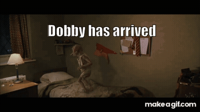 A Picture Of A Bedroom With The Words Dobby Has Arrived Above A Bed GIF