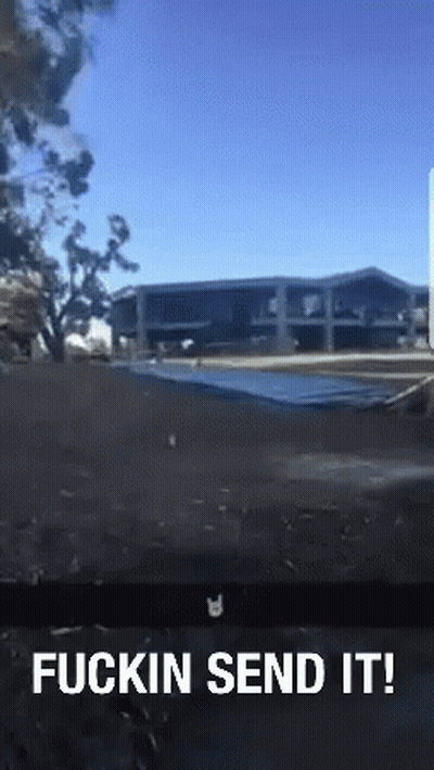 A Picture Of A Building With The Words " Fuckin Send It " At The Bottom GIF