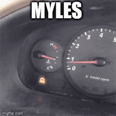 A Picture Of A Car Dashboard With The Words Myles Written On It GIF