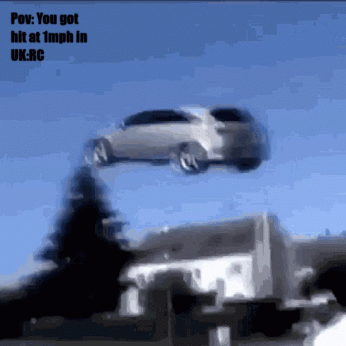 A Picture Of A Car Flying Through The Air With The Caption Pov You Got Hit At 1Mph In Uk.rc GIF