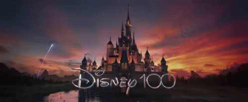 A Picture Of A Castle With The Words Disney 100 On It GIF
