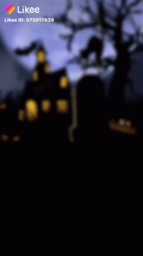 A Picture Of A Cemetery With A Haunted House In The Background And A Likee Icon GIF
