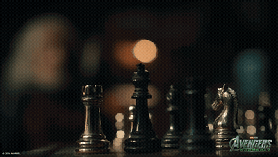 A Picture Of A Chess Board With The Words Avengers On It GIF