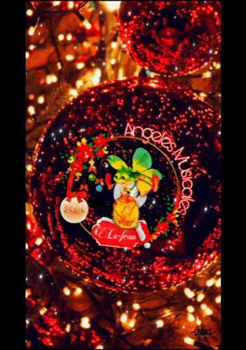 A Picture Of A Christmas Decoration With The Words Angeles Misceles On It GIF