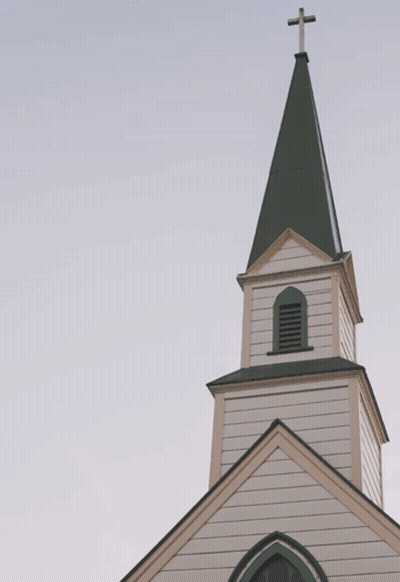 A Picture Of A Church Tower With A Dove And The Word Spirit Above It GIF