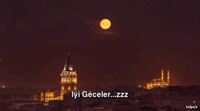 A Picture Of A City At Night With The Words Iyi Geceler Zzz On It GIF