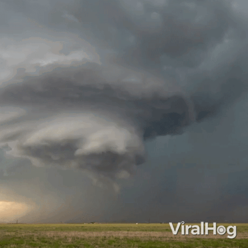 A Picture Of A Cloudy Sky With The Word Viralhog On The Bottom GIF