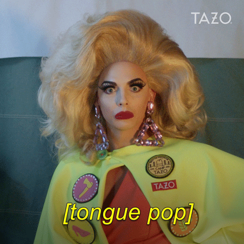 A Picture Of A Drag Queen With The Words Tongue Pop On The Bottom GIF