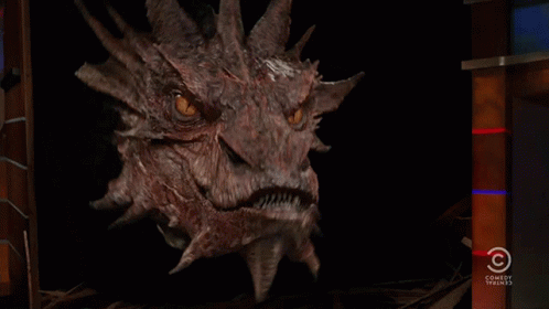 A Picture Of A Dragon And The Words Just Call GIF