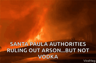 A Picture Of A Fire With The Caption Santa Paula Authorities Ruling Out Arson ... But Not Vodka GIF