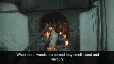 A Picture Of A Fireplace With The Words " When These Woods Are Burned They Smell Sweet And Savoury " GIF