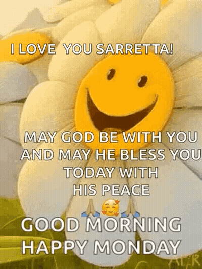 A Picture Of A Flower With A Smiley Face On It . GIF