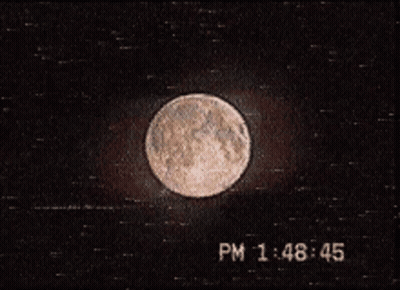 A Picture Of A Full Moon With The Time Of 1:48 45 GIF