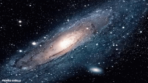 A Picture Of A Galaxy With The Words Memes Giggle On The Bottom GIF