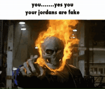 A Picture Of A Ghost Rider With Flames Coming Out Of His Head . GIF