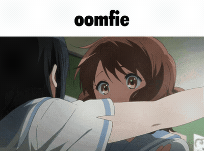 A Picture Of A Girl Hugging Another Girl With A Caption That Says ' Oomfie ' GIF