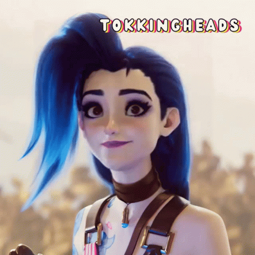 A Picture Of A Girl With Blue Hair And The Words Tokningheads Above Her GIF