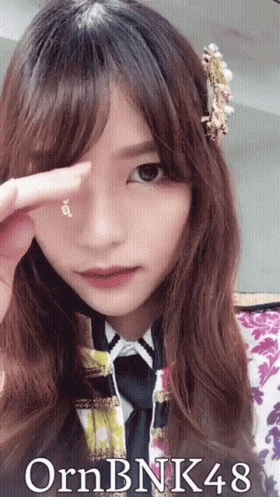 A Picture Of A Girl With The Name Ornbnk48 GIF