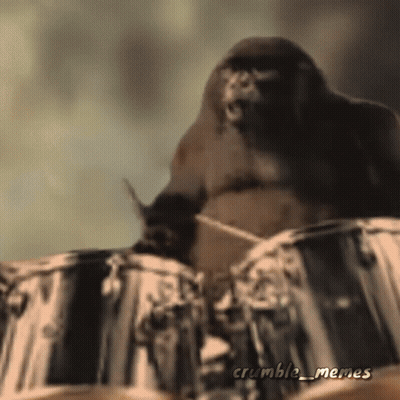 A Picture Of A Gorilla Playing Drums With The Words Crumble_memes Below It GIF