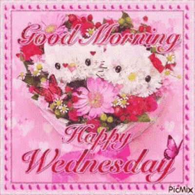 A Picture Of A Heart Shaped Bouquet Of Flowers With The Words Good Morning Happy Wednesday GIF