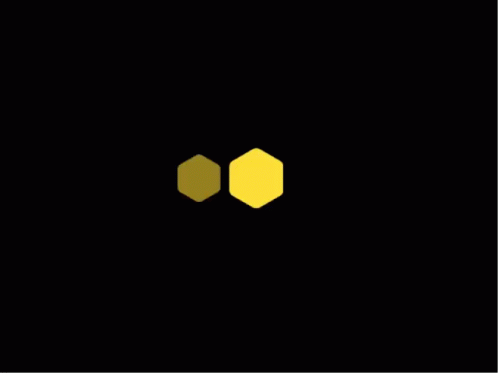 A Picture Of A Honeycomb With A Black Background GIF