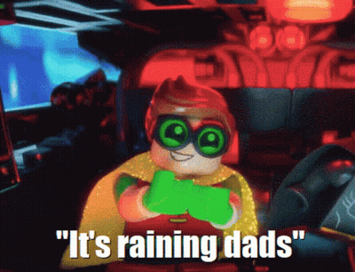 A Picture Of A Lego Character With The Words " It 'S Raining Dads " Below Him GIF