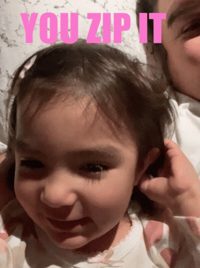 A Picture Of A Little Girl With The Words You Zip It GIF