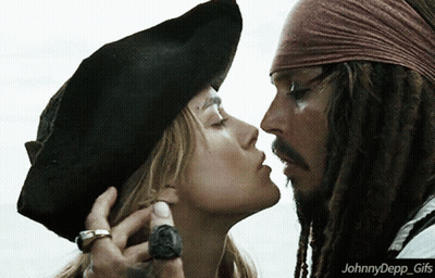A Picture Of A Man And A Woman Kissing With The Caption Johnnydepp Gifs GIF