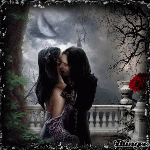 A Picture Of A Man And Woman Kissing With The Word Blingee On The Bottom Right GIF