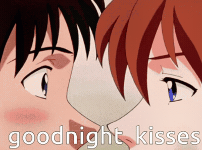 A Picture Of A Man And Woman Kissing With The Words Goodnight Kisses Above Them GIF