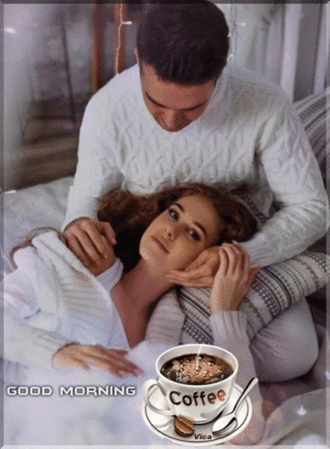 A Picture Of A Man And Woman With A Cup Of Coffee That Says Coffee On It GIF