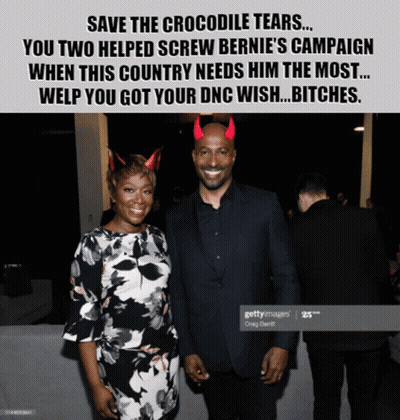 A Picture Of A Man And Woman With Devil Horns On Their Heads GIF