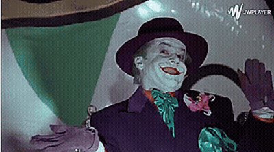 A Picture Of A Man Dressed As The Joker With Jwplayer In The Corner GIF