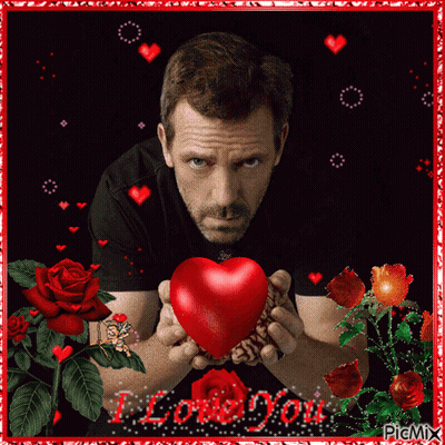 A Picture Of A Man Holding A Red Heart With The Words I Love You Written On The Bottom GIF