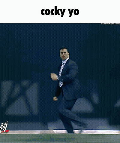 A Picture Of A Man In A Suit And Tie With The Caption Cocky Yo GIF