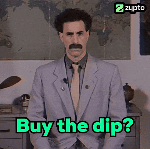 A Picture Of A Man In A Suit And Tie With The Words Buy The Dip GIF