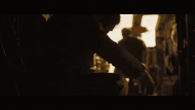 A Picture Of A Man In A Vehicle With The Words Juicy Juicy Above Him GIF