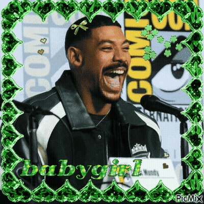 A Picture Of A Man Laughing With The Words Babygirl Written On It GIF