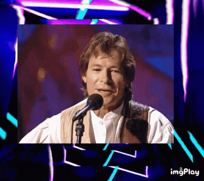 A Picture Of A Man Singing Into A Microphone With The Words Imgplay Below It GIF