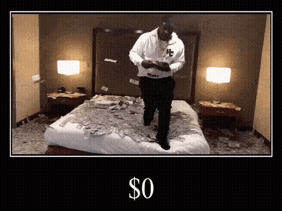 A Picture Of A Man Standing On A Bed With A Dollar Sign On The Bottom GIF