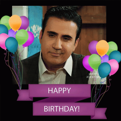 A Picture Of A Man Surrounded By Balloons And A Banner That Says " Happy Birthday " GIF