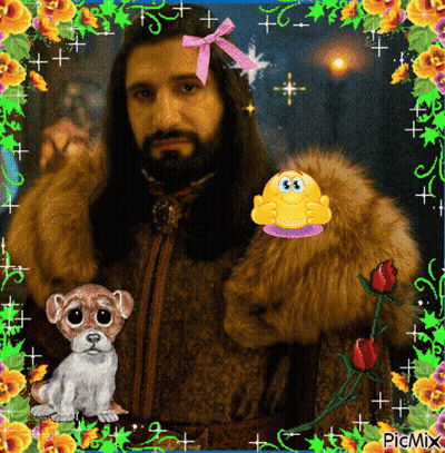 A Picture Of A Man With A Beard Is Surrounded By Flowers And A Cartoon Dog GIF