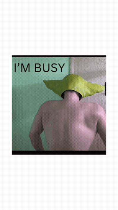 A Picture Of A Man With A Green Hat That Says I 'M Busy On The Bottom GIF