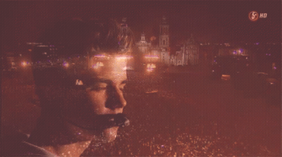 A Picture Of A Man With A Microphone And The Words 5 Hd On The Bottom Right GIF