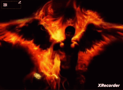 A Picture Of A Man With Fire Wings And The Name Ali On The Bottom GIF