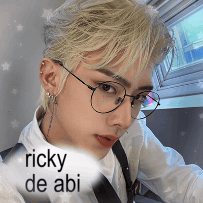 A Picture Of A Man With Glasses And The Name Ricky De Abi On The Bottom GIF